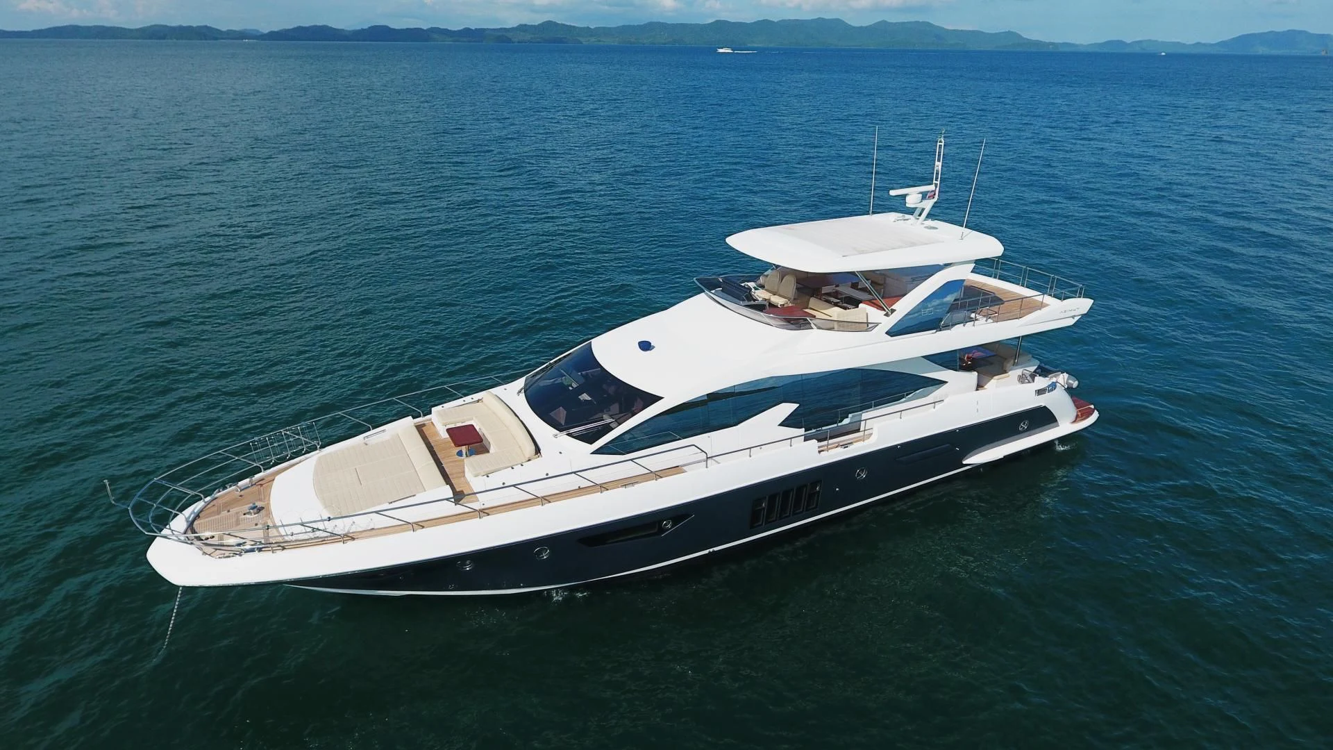 a white yacht in the water aboard SOLACE NT Yacht for Sale