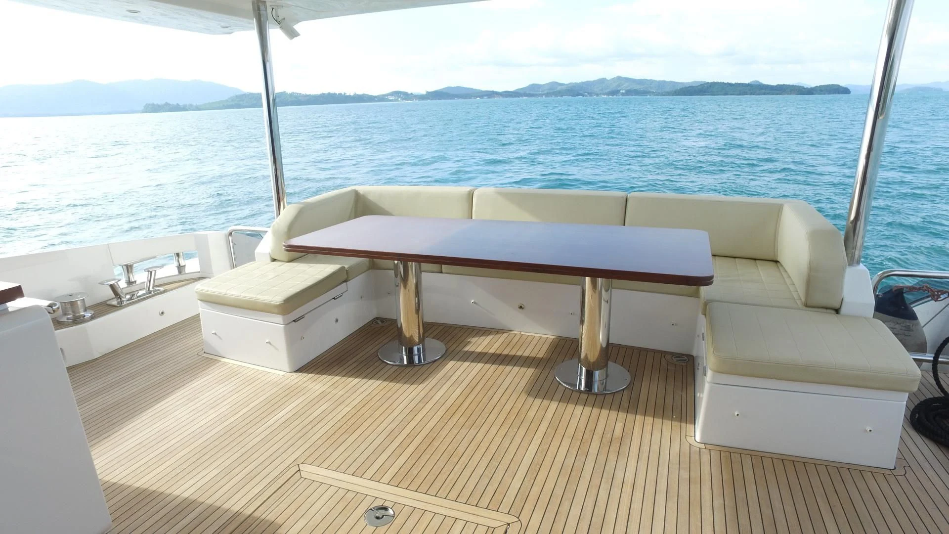 a white bed on a boat aboard SOLACE NT Yacht for Sale