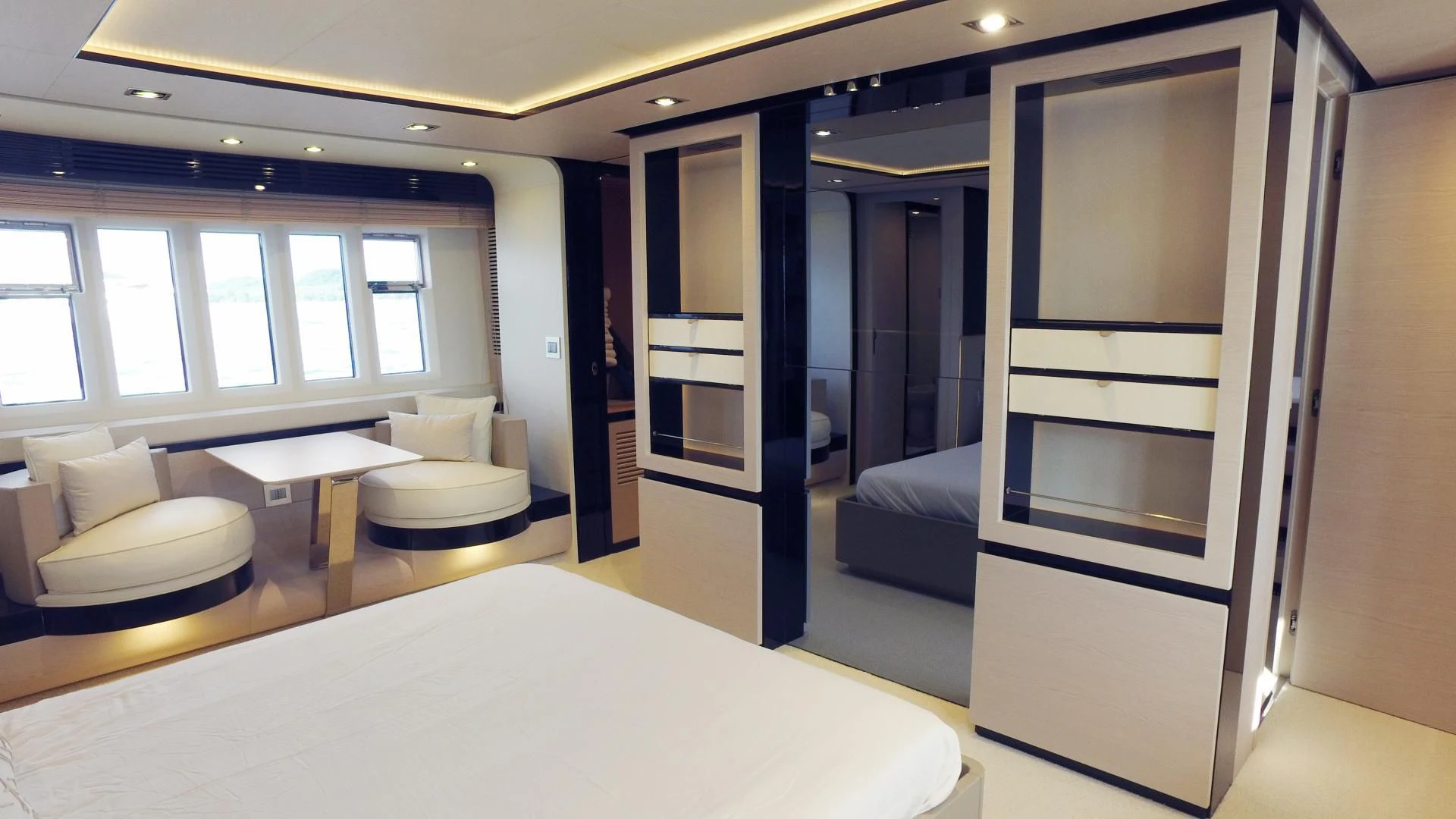 a room with a bed and a desk aboard SOLACE NT Yacht for Sale