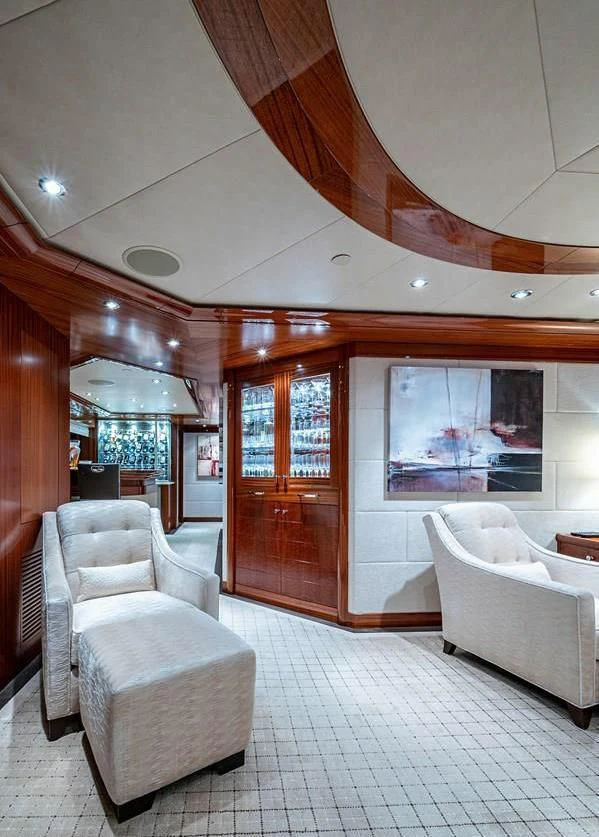 a room with a couch and a table aboard NIGHT HOWL Yacht for Sale