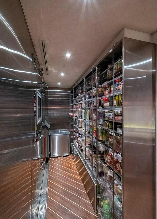 a large room with shelves of drinks aboard NIGHT HOWL Yacht for Sale