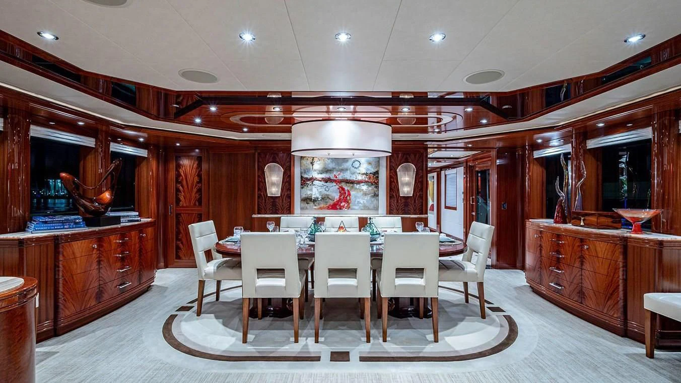 a large dining room with a table aboard NIGHT HOWL Yacht for Sale
