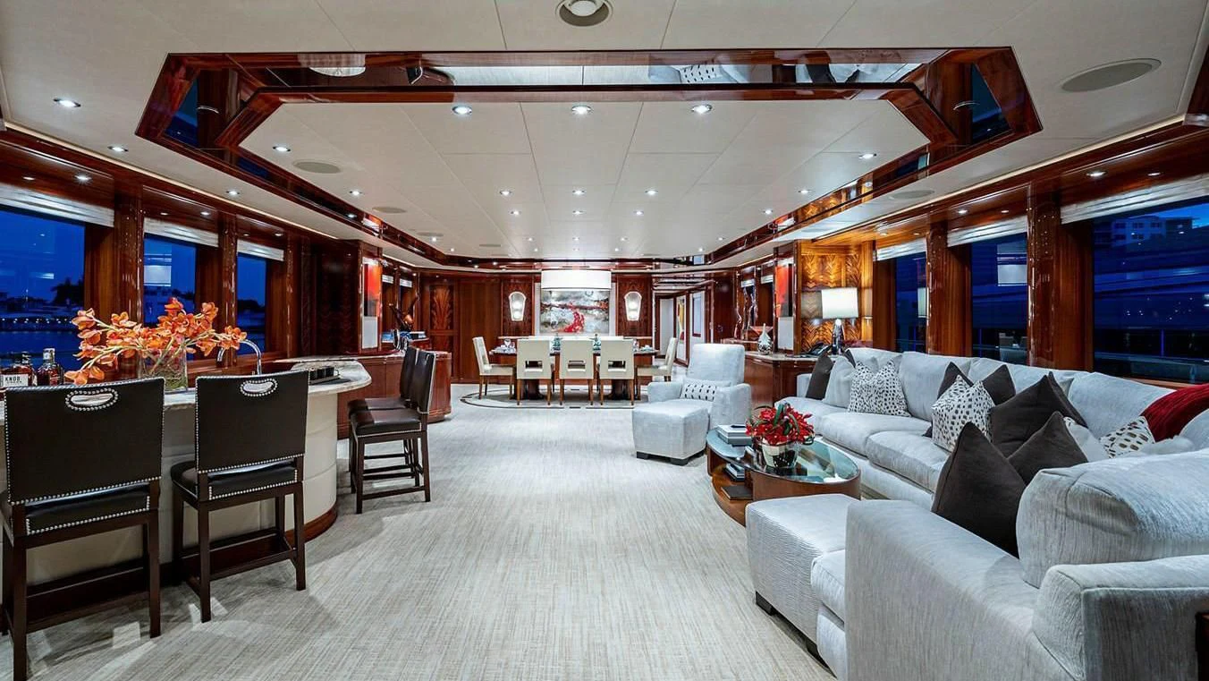 a living room with a large fireplace aboard NIGHT HOWL Yacht for Sale