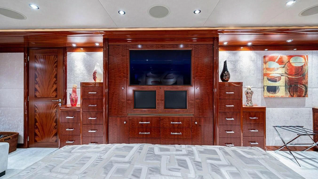 a kitchen with wooden cabinets aboard NIGHT HOWL Yacht for Sale