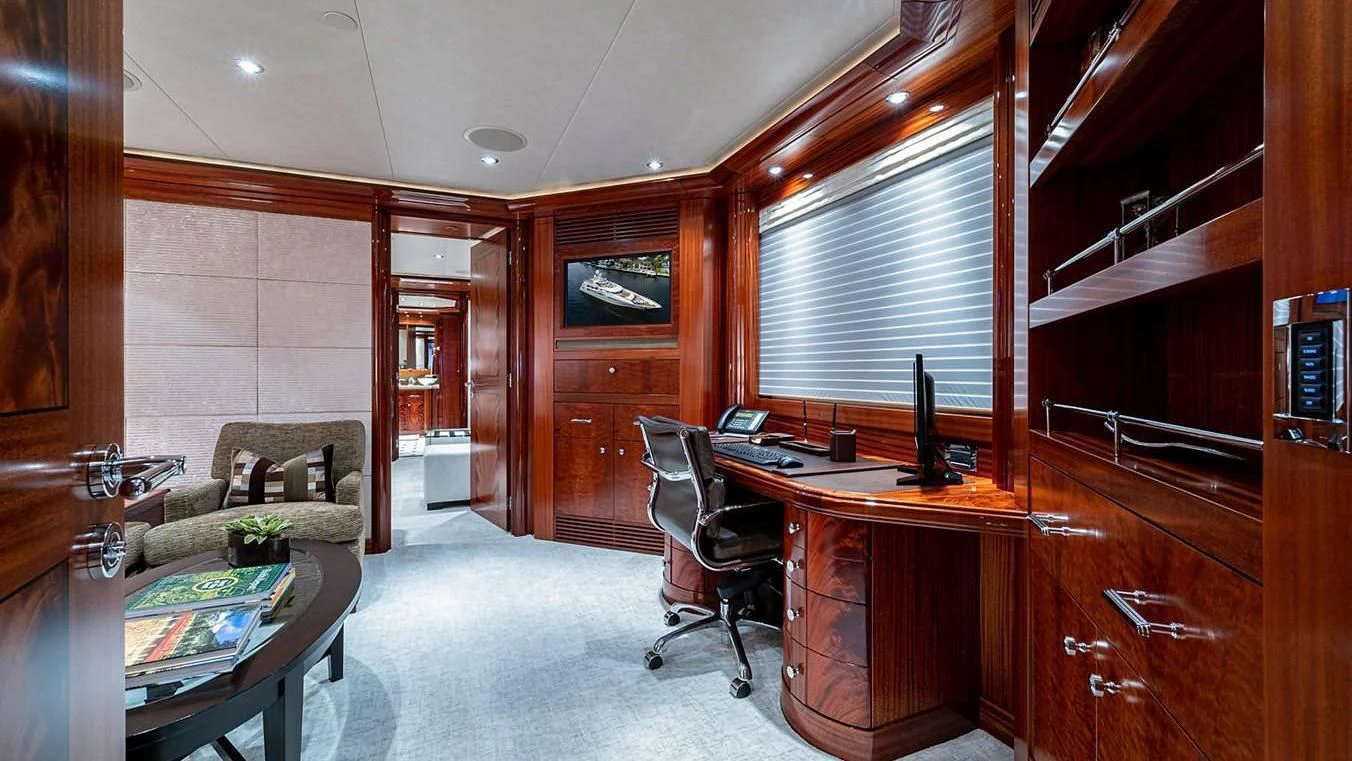 a room with a desk and a chair aboard NIGHT HOWL Yacht for Sale