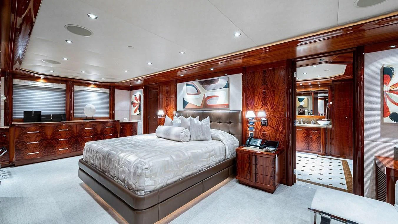 a large bedroom with a large bed aboard NIGHT HOWL Yacht for Sale
