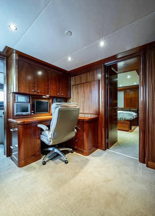 a room with a desk and a chair aboard NIGHT HOWL Yacht for Sale