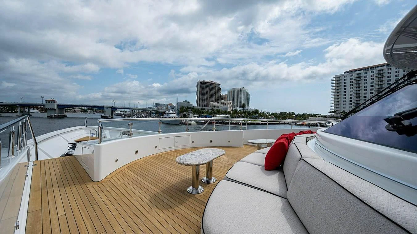a deck with a view of a city and water aboard NIGHT HOWL Yacht for Sale