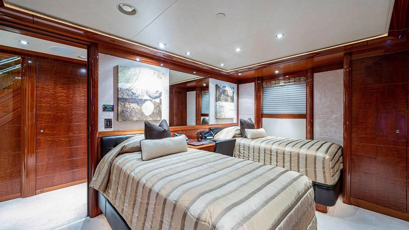 a room with two beds aboard NIGHT HOWL Yacht for Sale