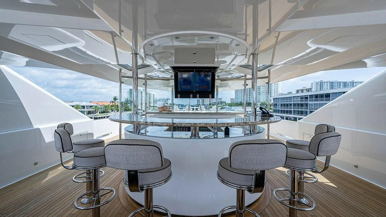 a room with a table and chairs aboard NIGHT HOWL Yacht for Sale
