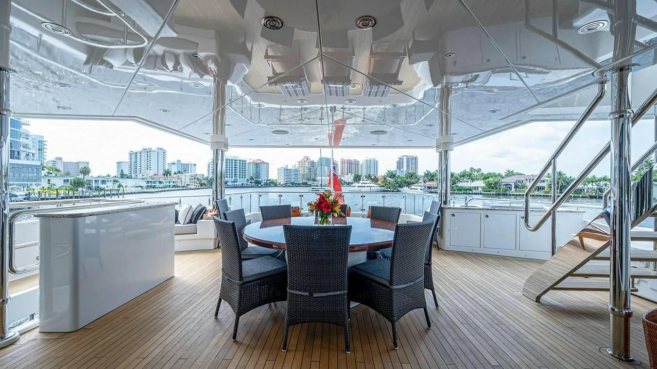 a room with a table and chairs aboard NIGHT HOWL Yacht for Sale