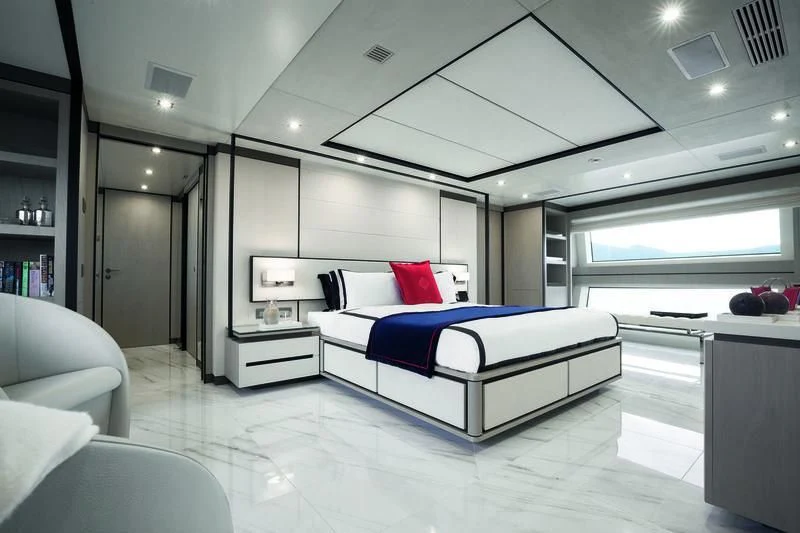 a large white room with a bed aboard WILLOW Yacht for Charter