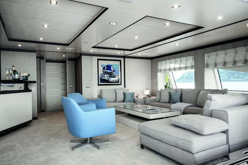 a living room with a couch and a table aboard WILLOW Yacht for Charter