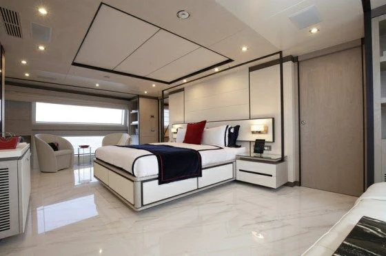 a large bedroom with a bed aboard WILLOW Yacht for Charter