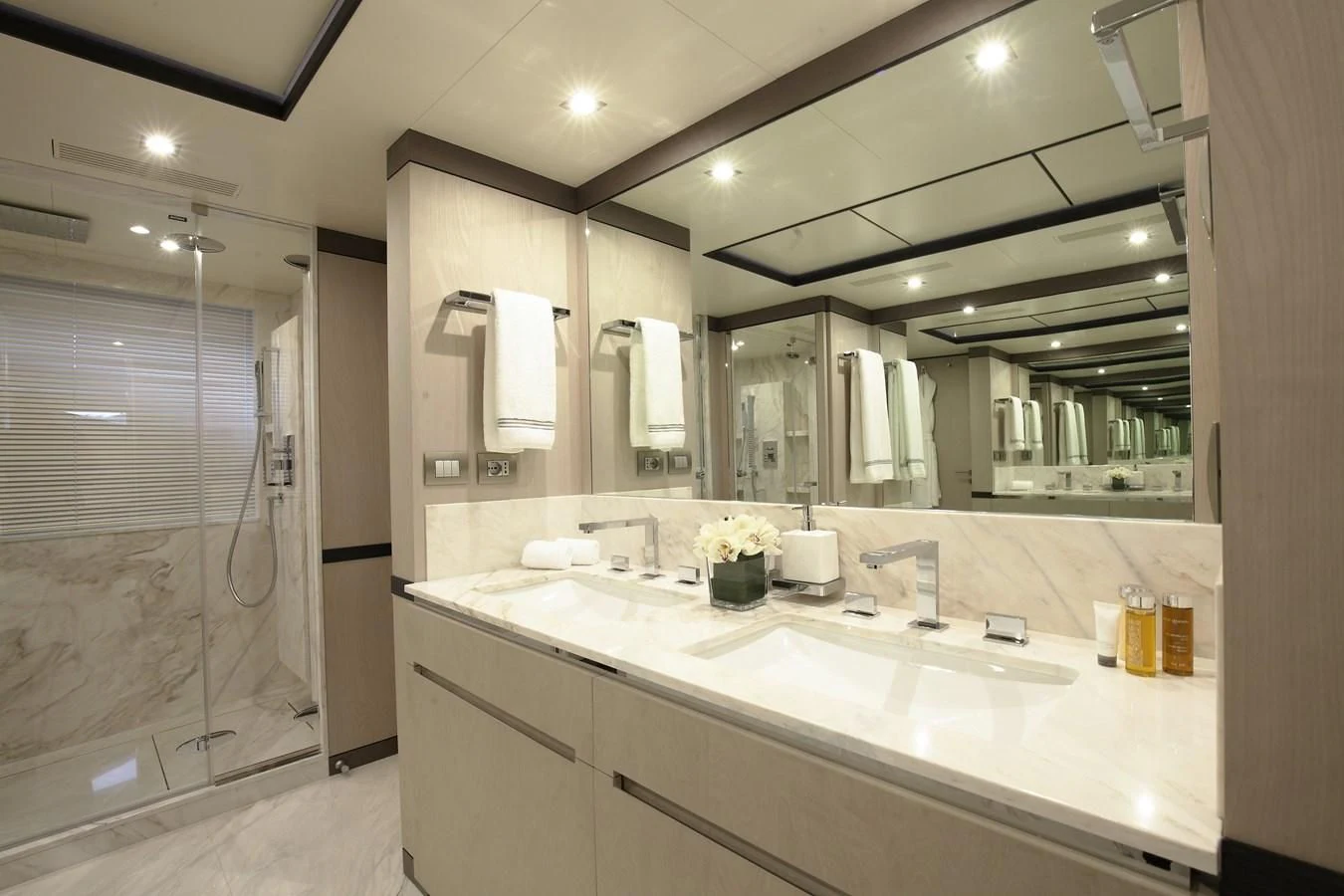 a bathroom with a large mirror aboard WILLOW Yacht for Charter