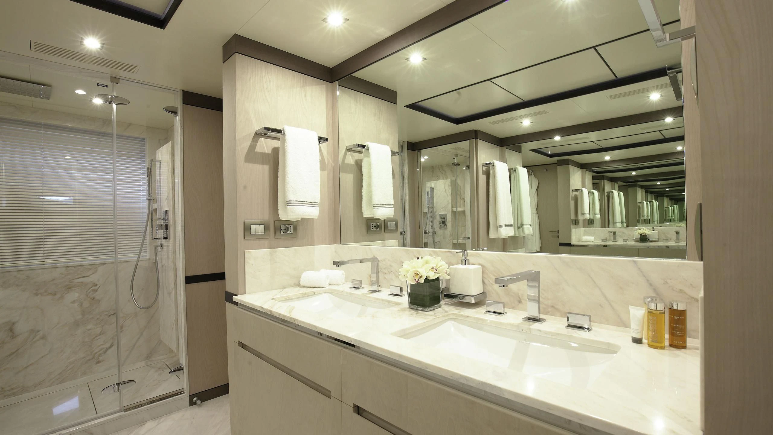 a bathroom with a large mirror aboard WILLOW Yacht for Charter