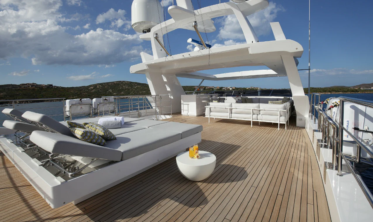 a large white yacht on a dock aboard WILLOW Yacht for Charter