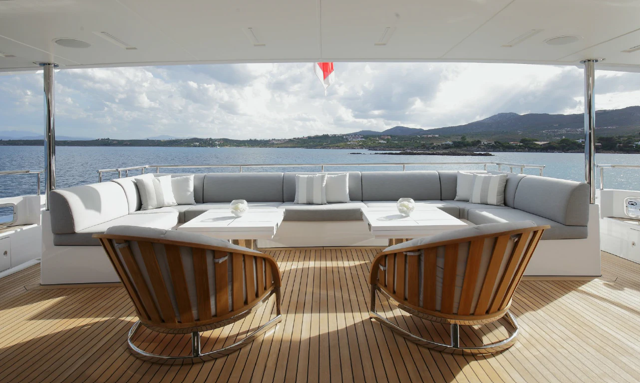 a room with a couch and chairs aboard WILLOW Yacht for Charter
