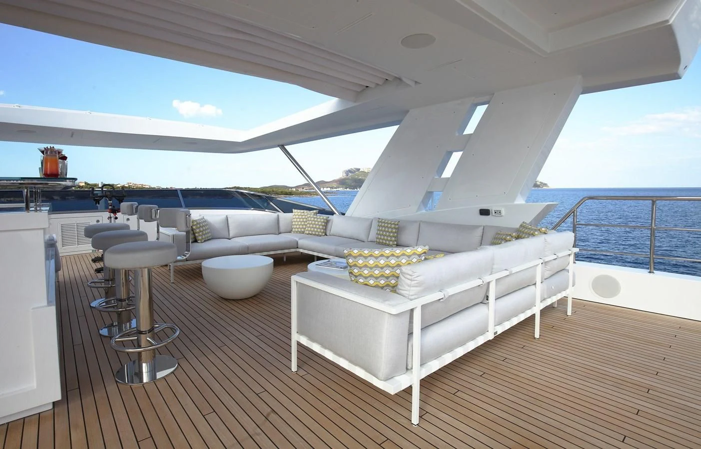 a white couch in a room aboard WILLOW Yacht for Charter
