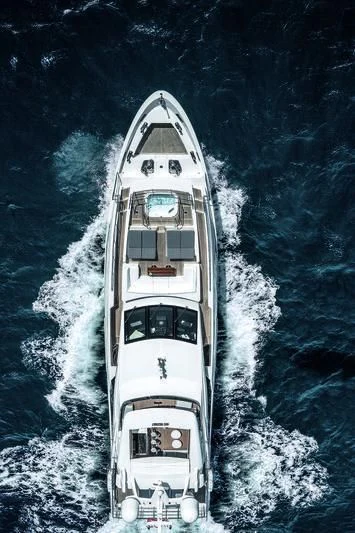 a white boat in the water aboard WILLOW Yacht for Charter