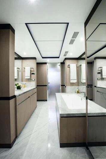 a large kitchen with a large island aboard WILLOW Yacht for Charter