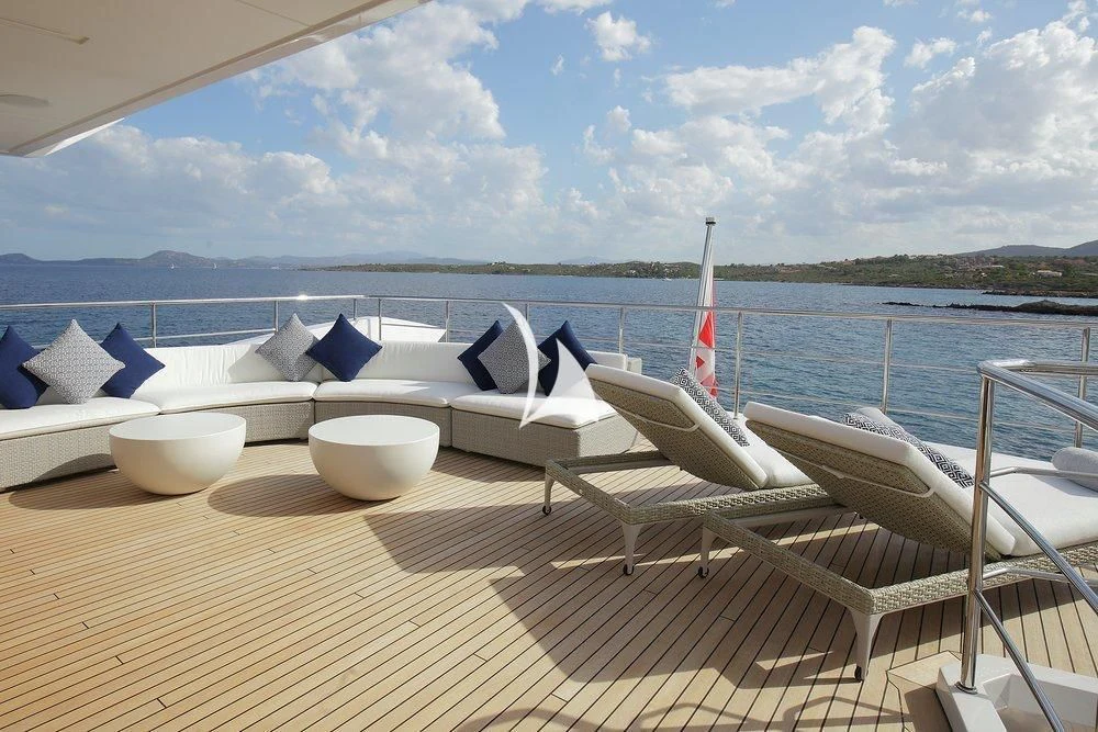 a deck with a view of a boat and a dock aboard WILLOW Yacht for Charter