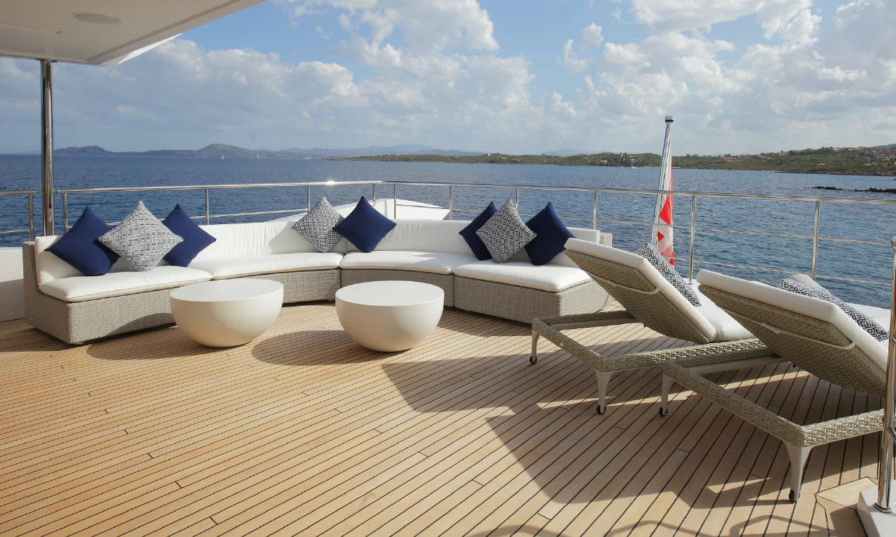 a deck with a view of a city and water aboard WILLOW Yacht for Charter