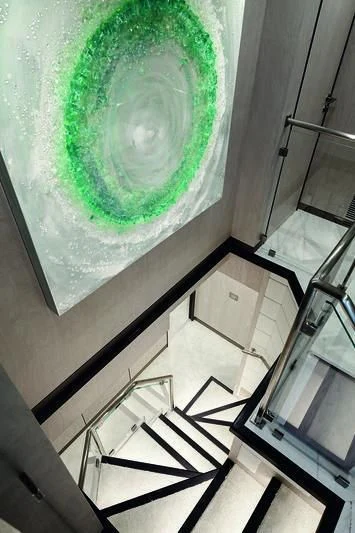 a green circle on a white surface aboard WILLOW Yacht for Charter