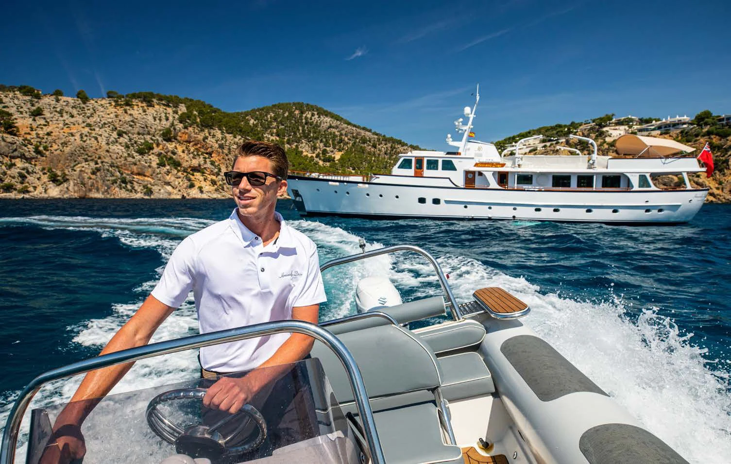 a man on a boat aboard HEAVENLY DAZE Yacht for Sale
