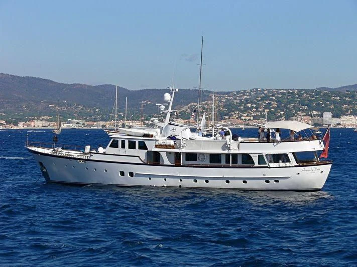 a boat on the water aboard HEAVENLY DAZE Yacht for Sale