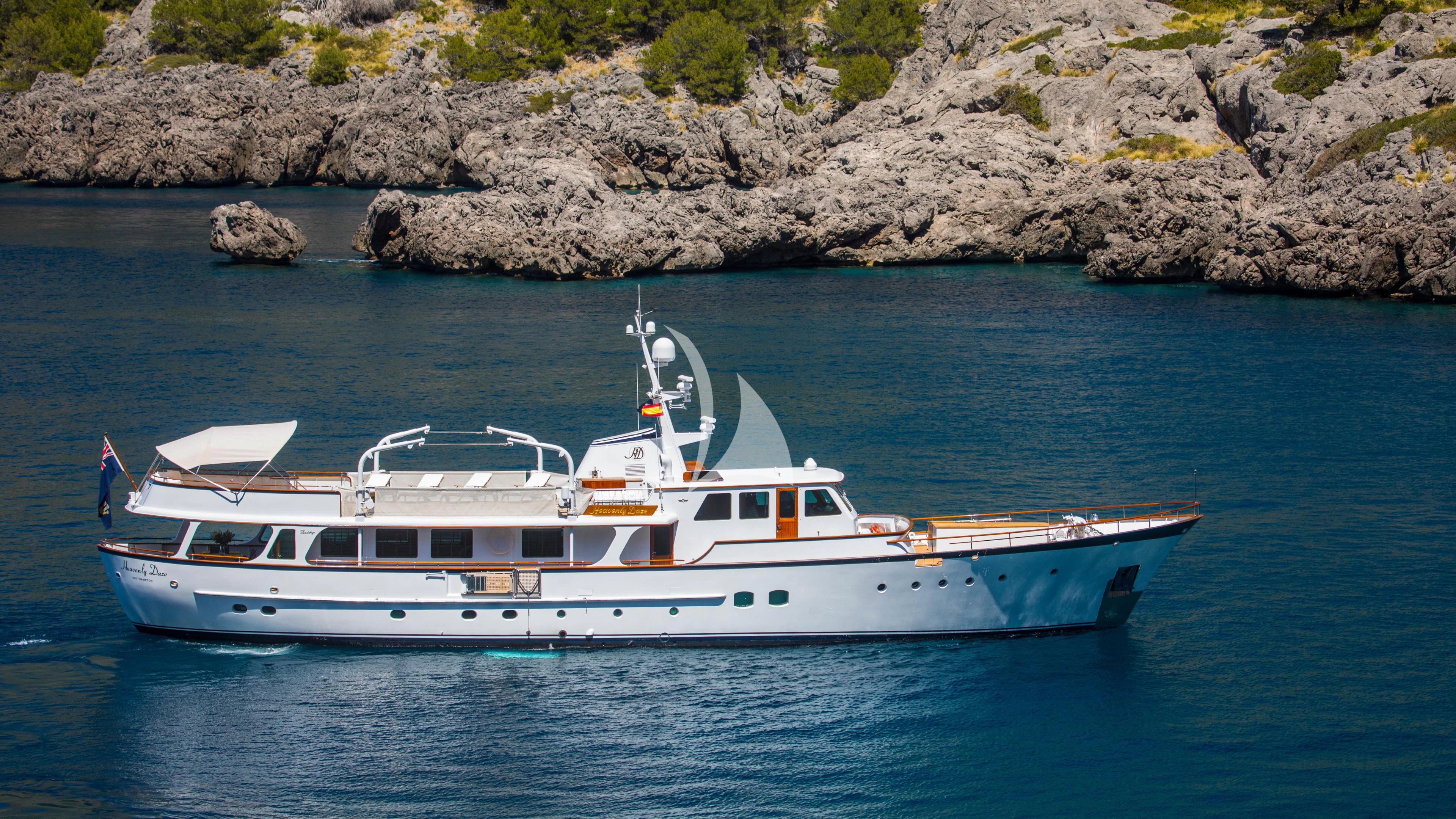 a boat on the water aboard HEAVENLY DAZE Yacht for Sale
