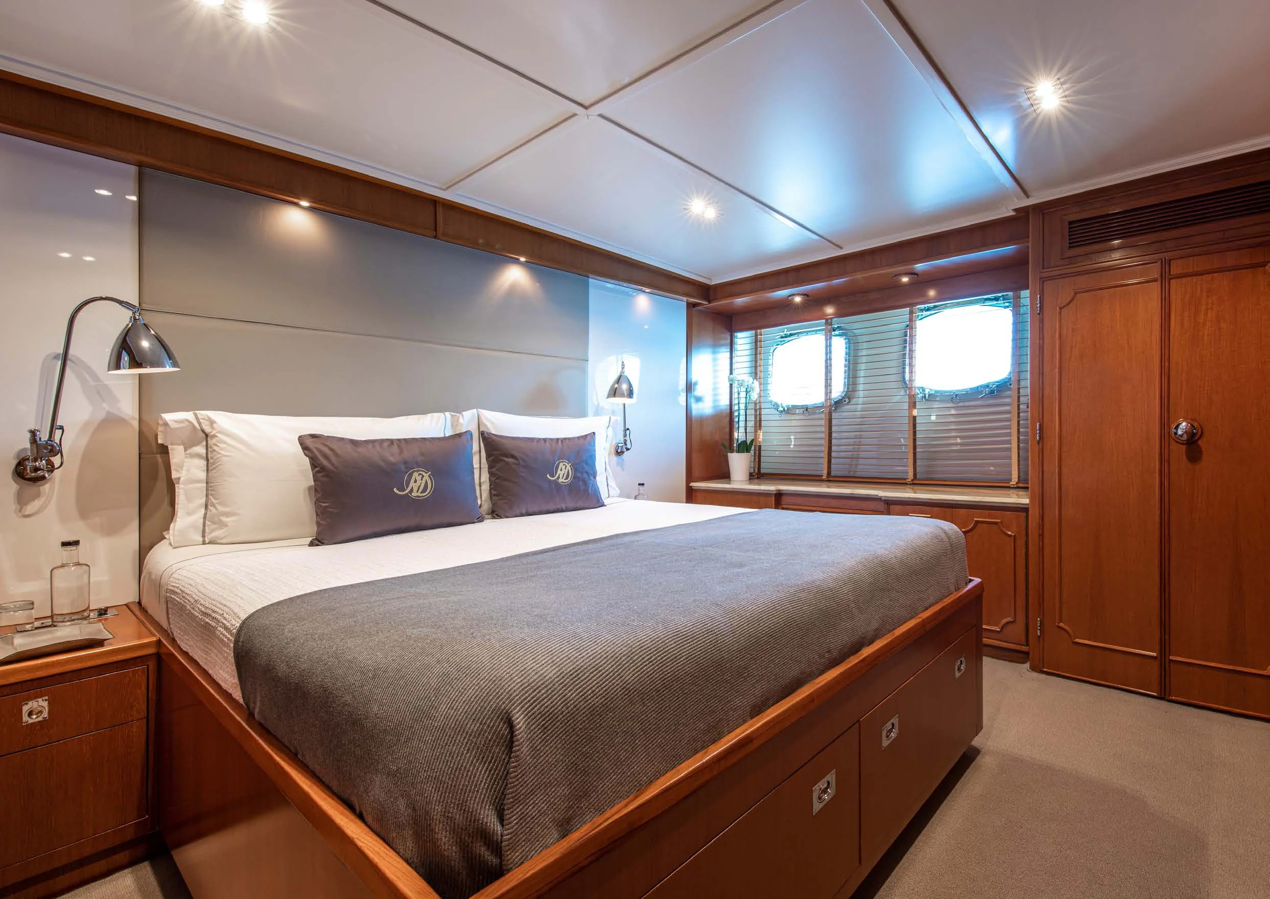 a bed with a white pillow aboard HEAVENLY DAZE Yacht for Sale