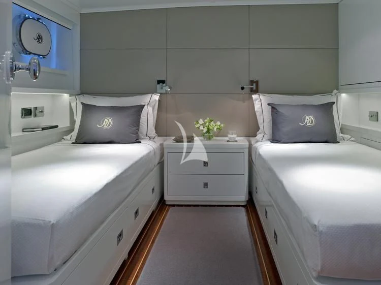a room with two beds aboard HEAVENLY DAZE Yacht for Sale
