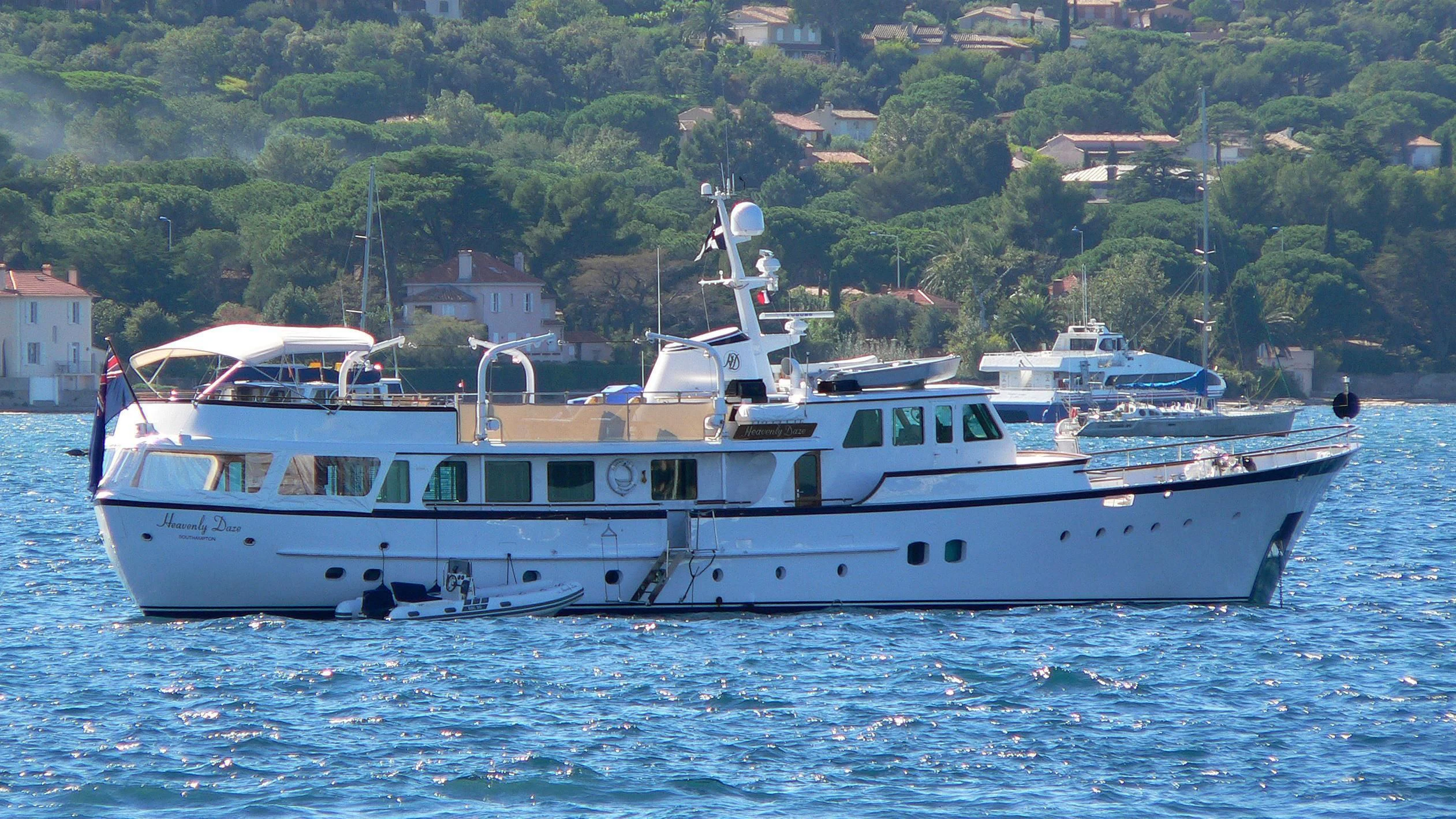 a boat on the water aboard HEAVENLY DAZE Yacht for Sale