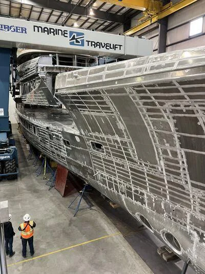 a large metal structure with people around it aboard INGOT Yacht for Sale