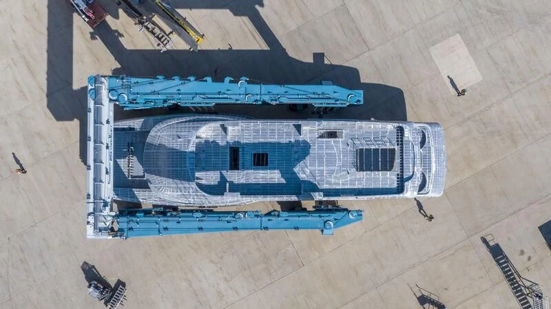 a large blue and white building aboard INGOT Yacht for Sale