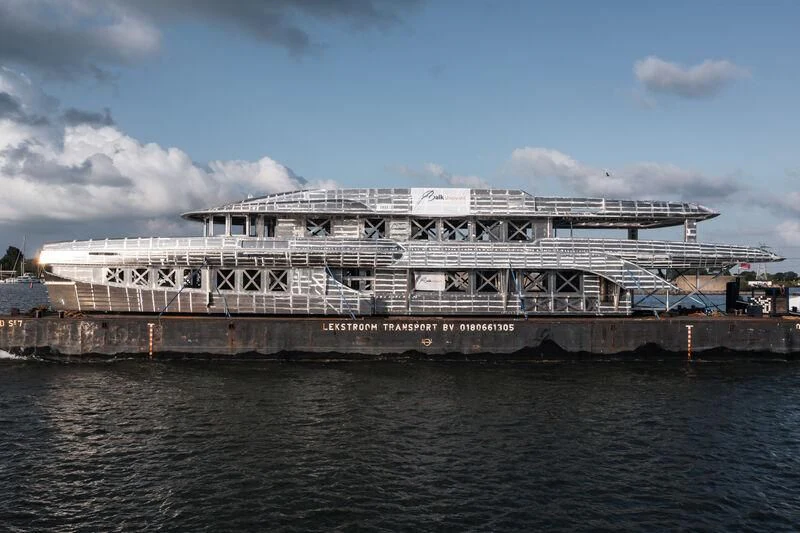 a large building with many windows aboard INGOT Yacht for Sale