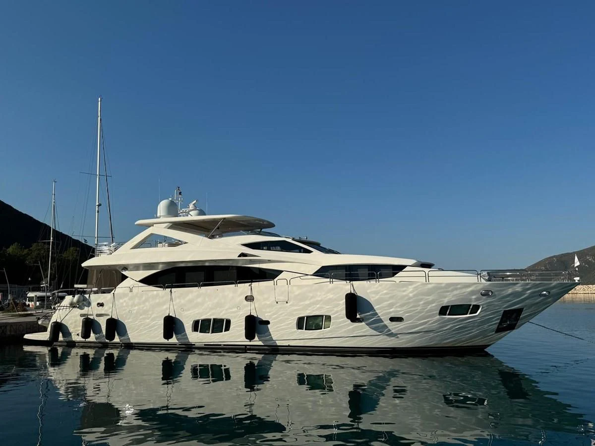 a boat docked at a pier aboard SOLARIS Yacht for Sale