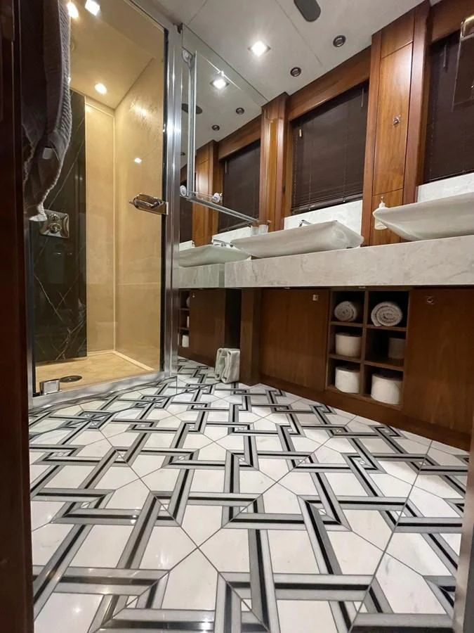a large kitchen with a large mirror aboard SOLARIS Yacht for Sale