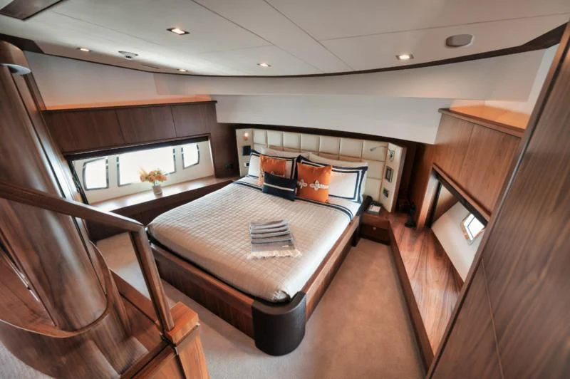 a bed in a room aboard SOLARIS Yacht for Sale