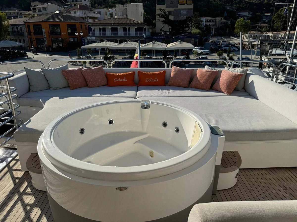 a white bathtub with a white round object on it aboard SOLARIS Yacht for Sale