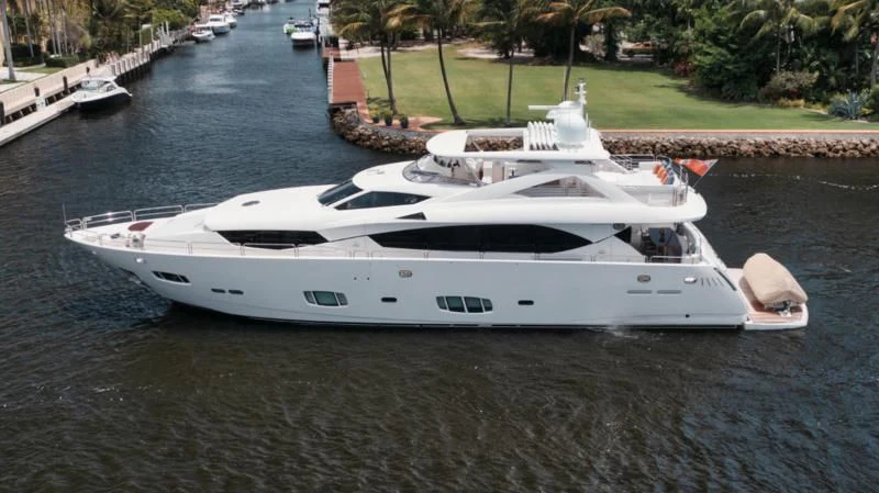 a white yacht on a river aboard SOLARIS Yacht for Sale