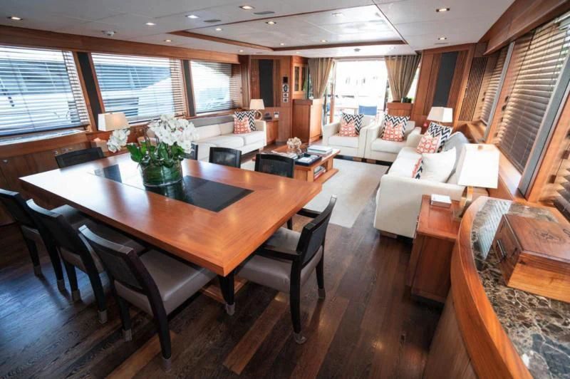 a dining room with a table and chairs aboard SOLARIS Yacht for Sale
