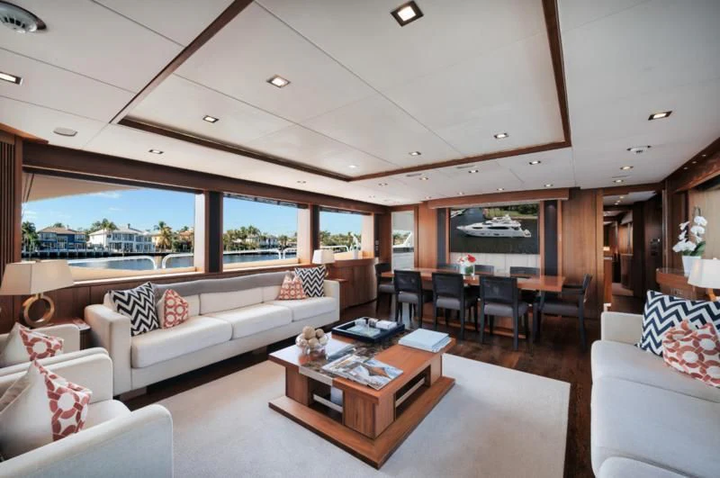 a living room with a large window aboard SOLARIS Yacht for Sale