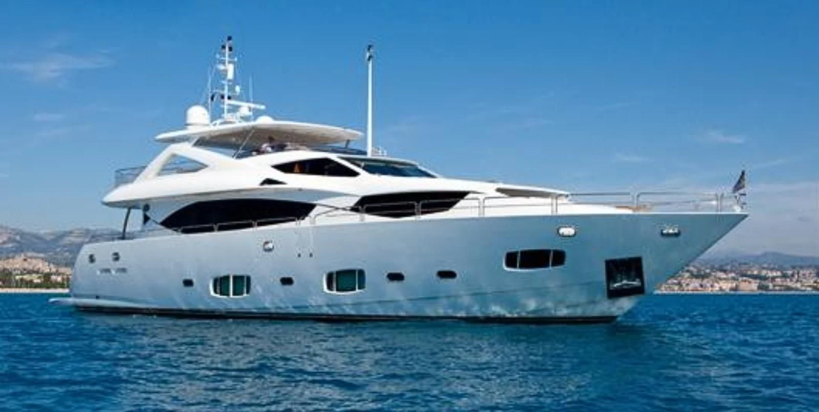 a white yacht in the water aboard SOLARIS Yacht for Sale