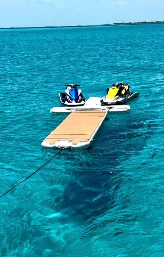 a couple of boats on the water aboard SOLARIS Yacht for Sale