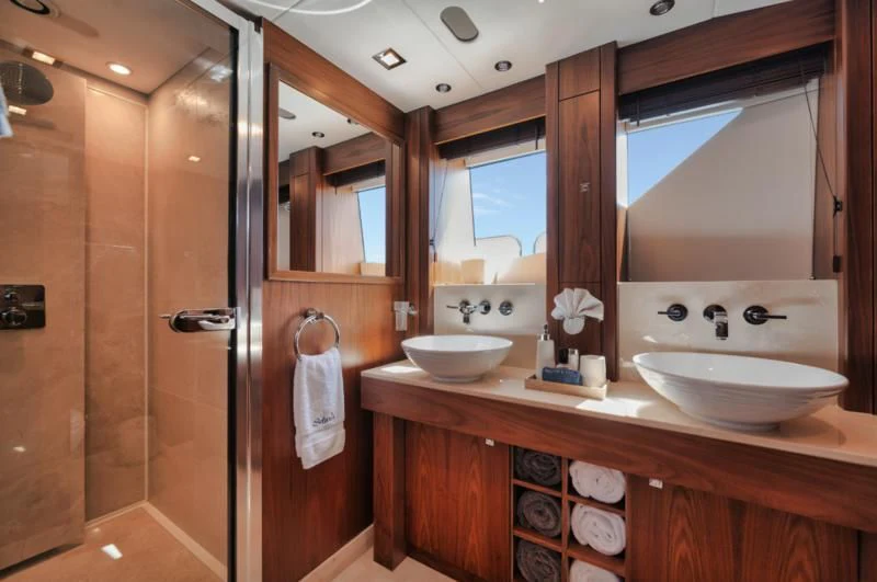 a bathroom with a sink and a shower aboard SOLARIS Yacht for Sale