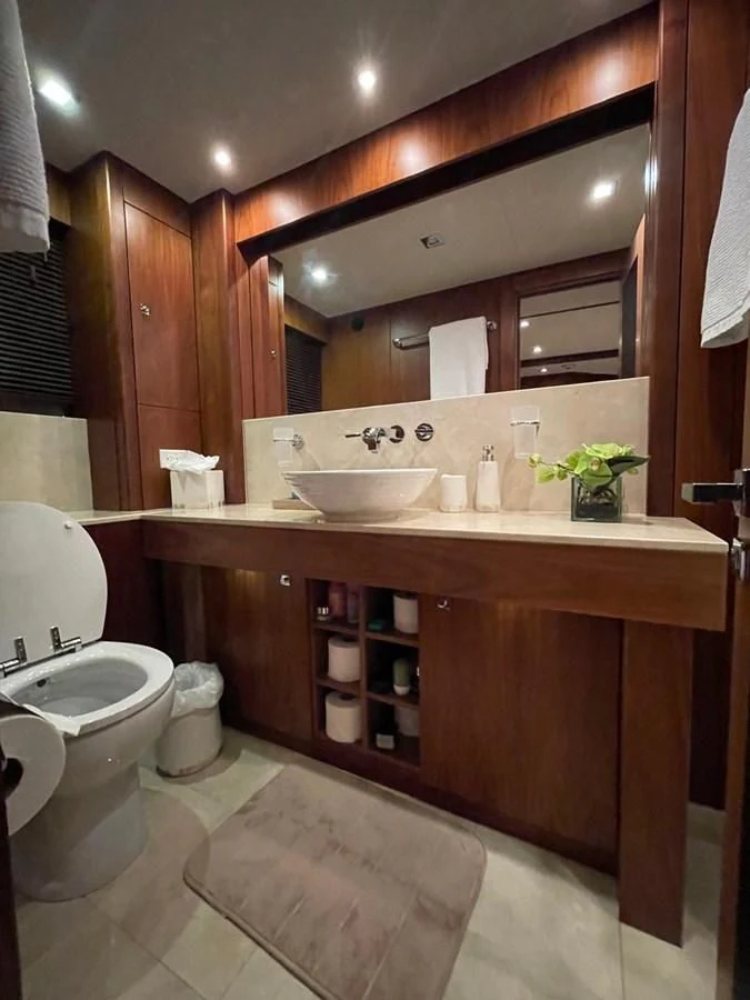 a bathroom with a sink and a toilet aboard SOLARIS Yacht for Sale