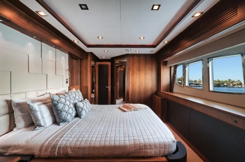 a bed in a room aboard SOLARIS Yacht for Sale