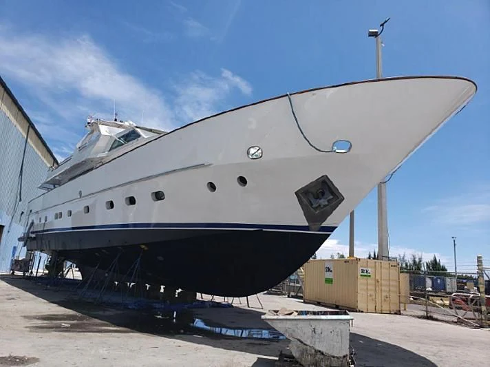 a large boat in a dock aboard TROTTER Yacht for Sale